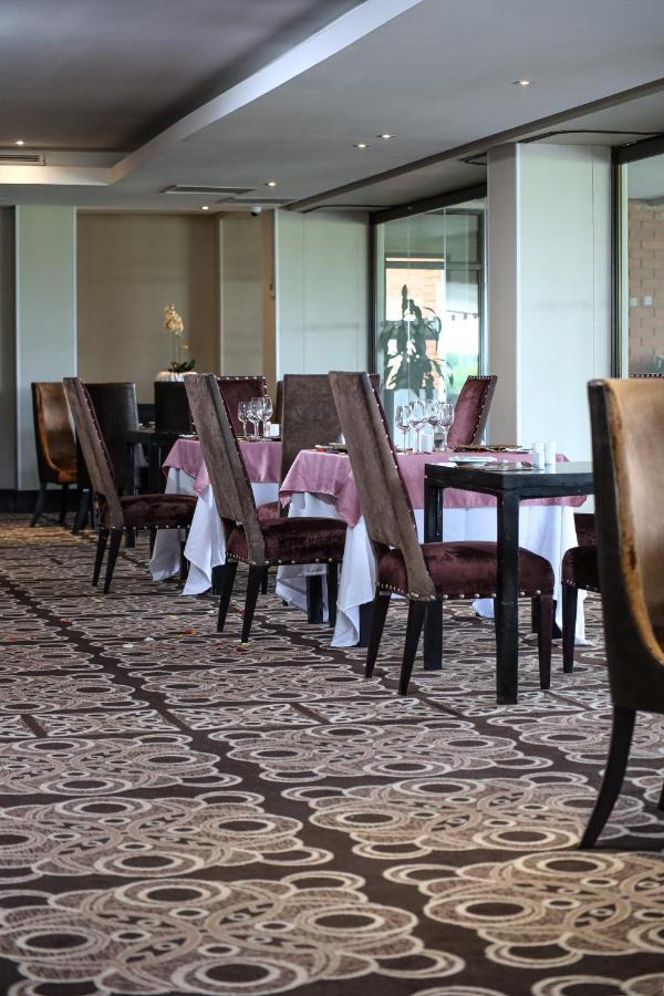 Royal Marang Hotel Phokeng Esterno foto The restaurant